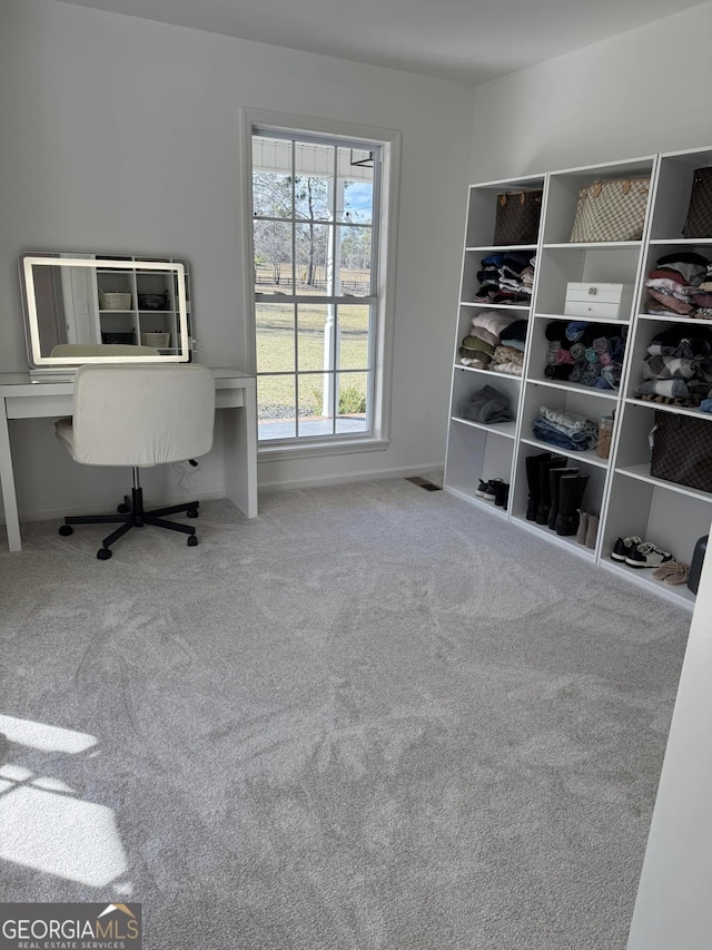 office space with carpet floors and baseboards