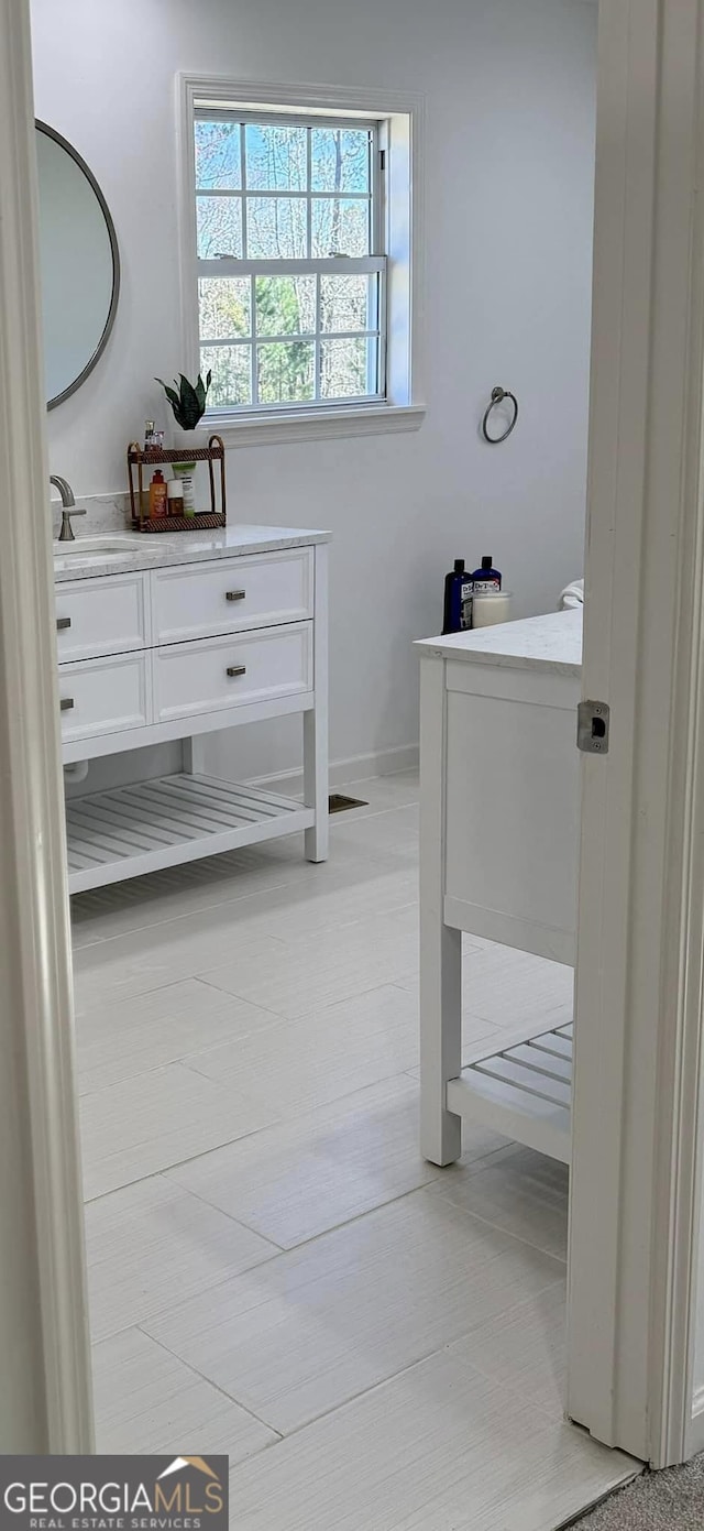 bathroom featuring vanity