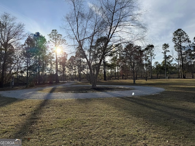 exterior space featuring aphalt driveway