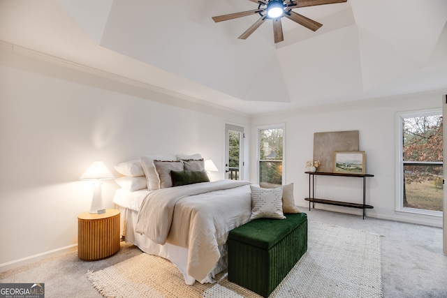 bedroom with carpet, ceiling fan, lofted ceiling, and baseboards