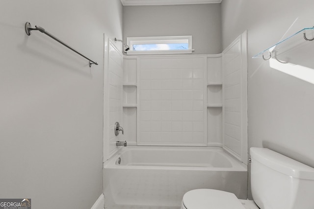 bathroom featuring toilet and shower / bathtub combination