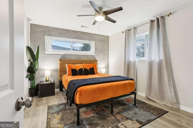 1415 Vesta Ave, Atlanta, GA 30344 - bedroom with wood finished floors and ceiling fan