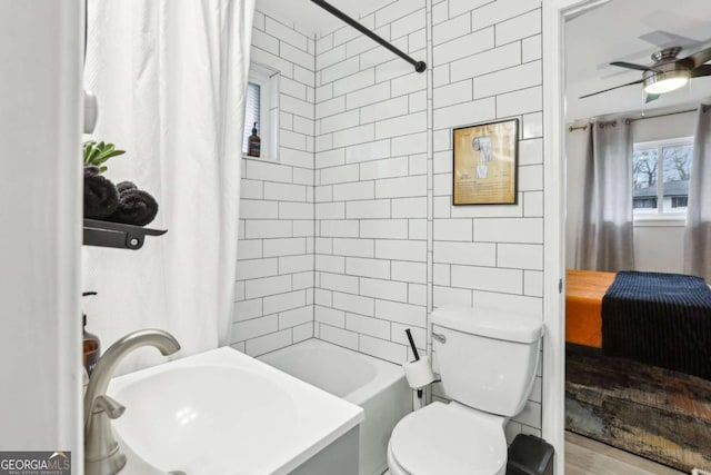 1415 Vesta Ave, Atlanta, GA 30344 - bathroom featuring ensuite bathroom, a ceiling fan, and shower / tub combo