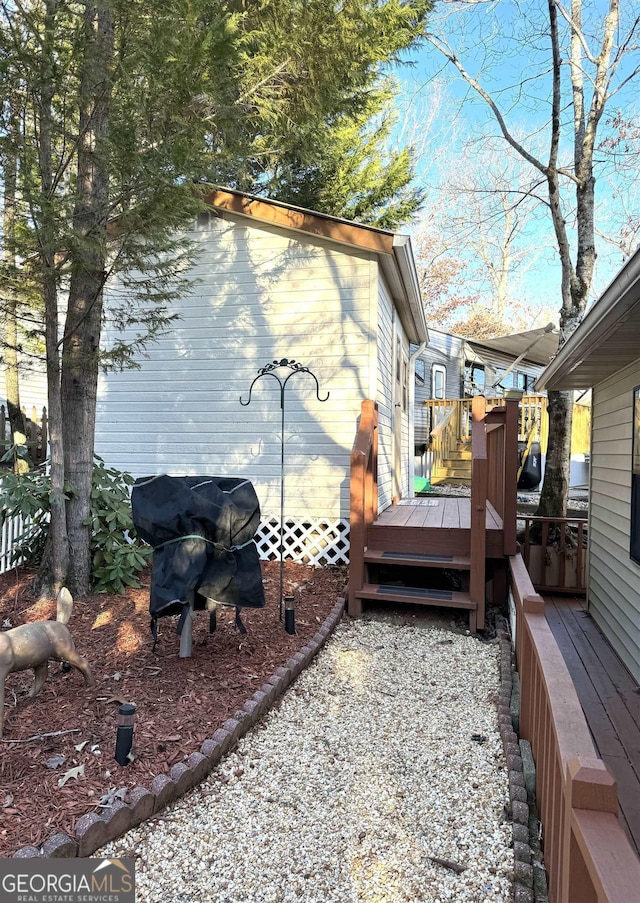 exterior space with a wooden deck