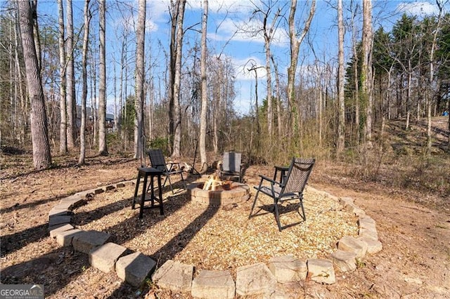 view of patio featuring a fire pit