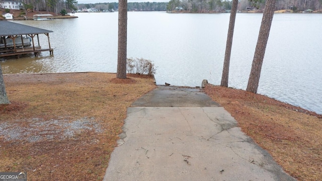 dock area featuring a water view