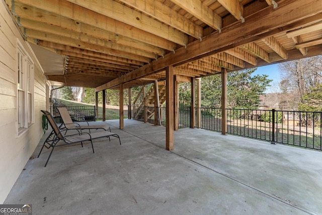 view of patio / terrace featuring fence