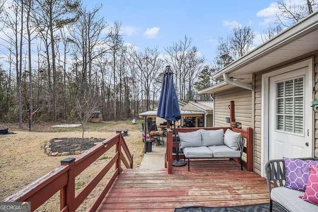 deck with an outdoor living space