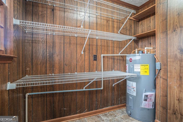 utility room with water heater