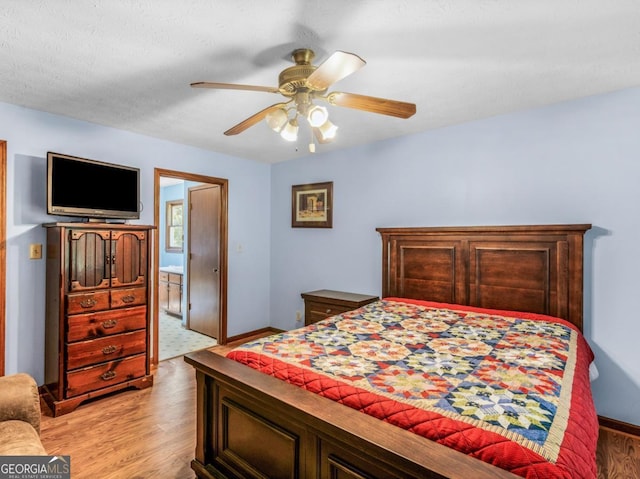 2643 Rocky Creek Rd, Hampton, GA 30228 - bedroom featuring baseboards, a ceiling fan, and light wood-style floors