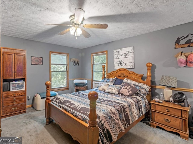 2643 Rocky Creek Rd, Hampton, GA 30228 - bedroom with a textured ceiling, light colored carpet, baseboards, and ceiling fan