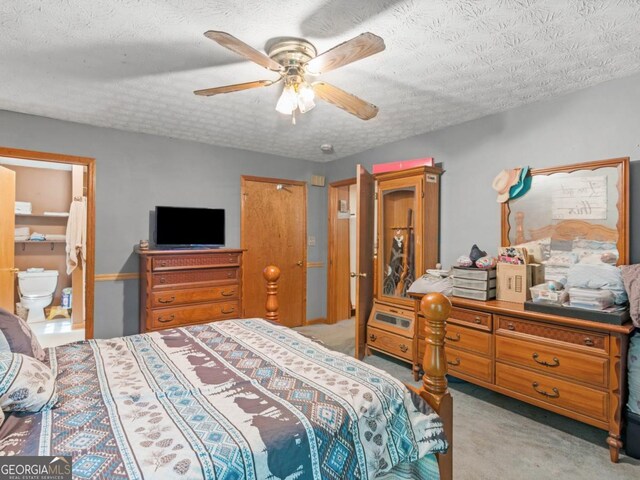 2643 Rocky Creek Rd, Hampton, GA 30228 - bedroom featuring light carpet, a textured ceiling, and a ceiling fan