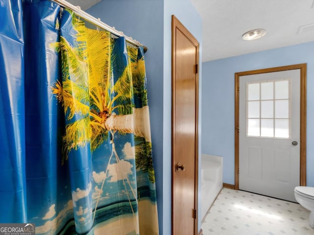 2643 Rocky Creek Rd, Hampton, GA 30228 - bathroom with tile patterned floors, toilet, a shower with shower curtain, and a washtub