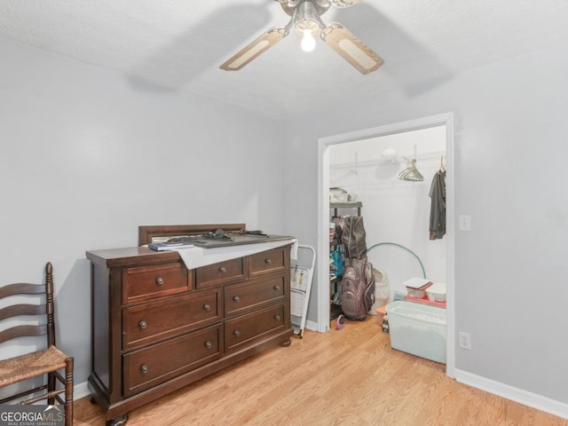 2643 Rocky Creek Rd, Hampton, GA 30228 - bedroom featuring a closet, ceiling fan, light wood-type flooring, and baseboards