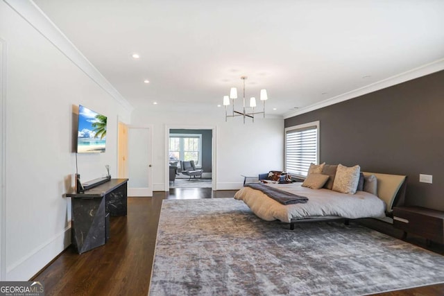 bedroom with baseboards, multiple windows, dark wood finished floors, and crown molding