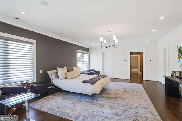 bedroom featuring a notable chandelier, dark wood-type flooring, ornamental molding, recessed lighting, and baseboards