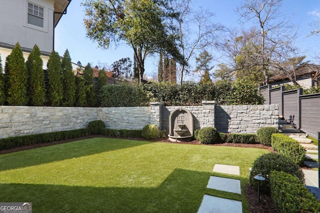 view of yard featuring fence