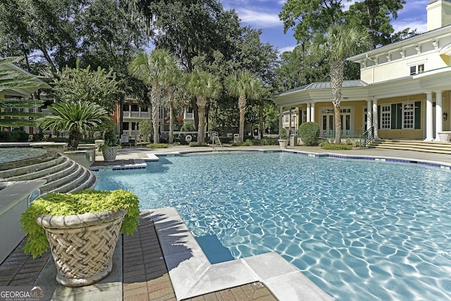 community pool featuring a patio