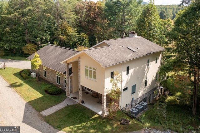 bird's eye view featuring a view of trees