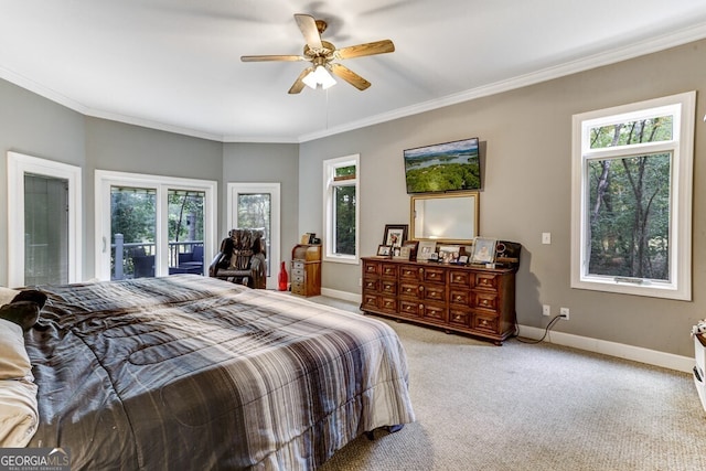 bedroom featuring a ceiling fan, baseboards, access to exterior, crown molding, and carpet flooring