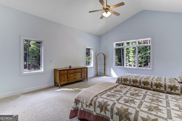 bedroom with carpet flooring, ceiling fan, high vaulted ceiling, and baseboards