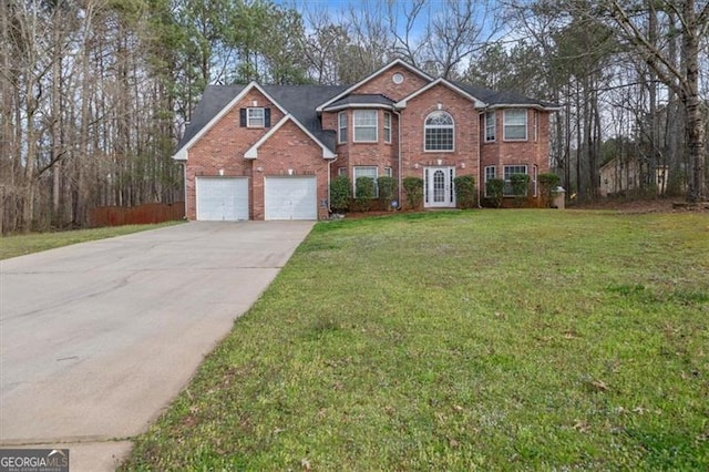 colonial house featuring brick siding, a front lawn, french doors, a garage, and driveway