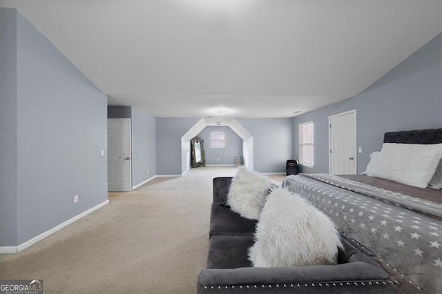 bedroom with baseboards and carpet floors