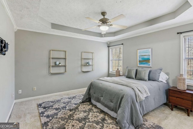 4125 Gables Pl, Buford, GA 30519 - bedroom featuring a raised ceiling, a textured ceiling, carpet, ornamental molding, and a ceiling fan