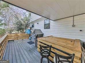 deck with outdoor dry bar