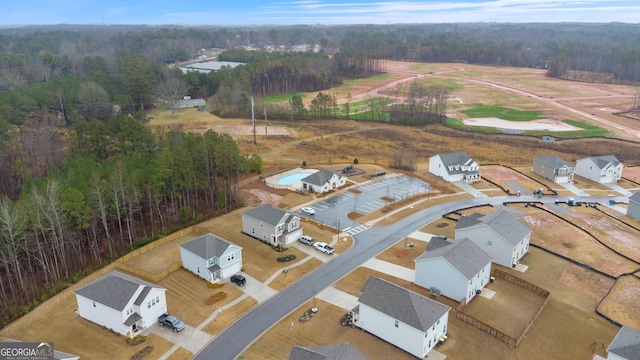 aerial view featuring a forest view