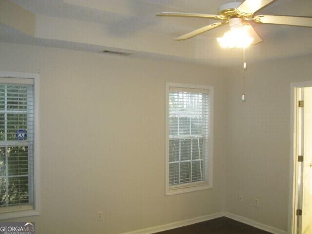103 Twilight Ct, Jackson, GA 30233 - empty room with baseboards and a ceiling fan