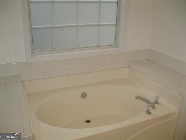 103 Twilight Ct, Jackson, GA 30233 - bathroom with a garden tub