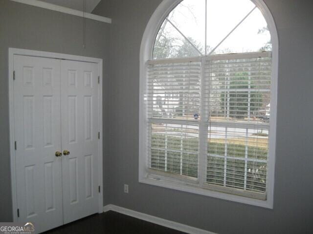 103 Twilight Ct, Jackson, GA 30233 - unfurnished bedroom featuring a closet and baseboards
