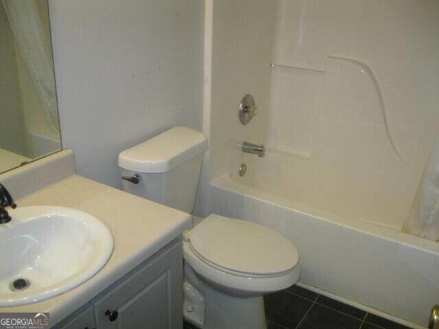 103 Twilight Ct, Jackson, GA 30233 - bathroom featuring shower / bath combo, tile patterned floors, and vanity