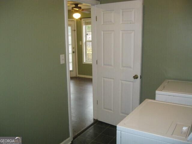 103 Twilight Ct, Jackson, GA 30233 - laundry area with dark tile patterned floors, a ceiling fan, separate washer and dryer, baseboards, and laundry area
