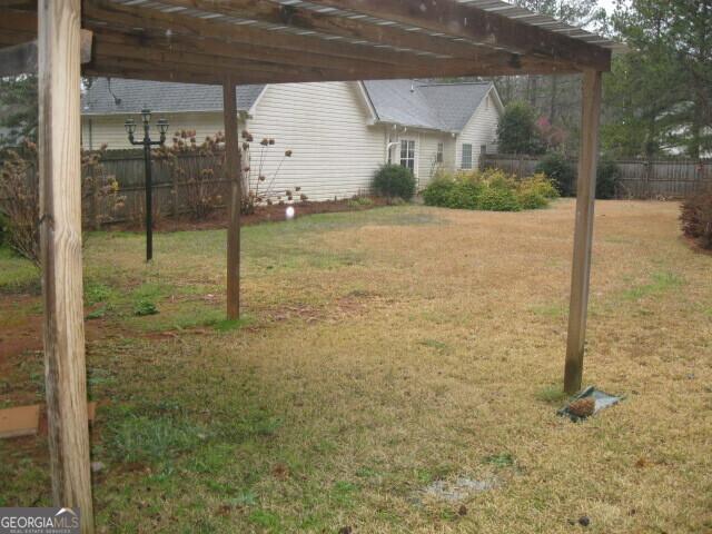 103 Twilight Ct, Jackson, GA 30233 - view of yard featuring fence