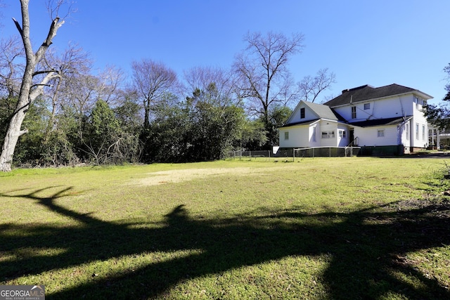 view of yard featuring fence