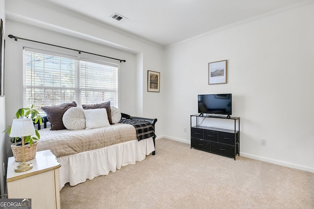 bedroom with baseboards, carpet, visible vents, and ornamental molding