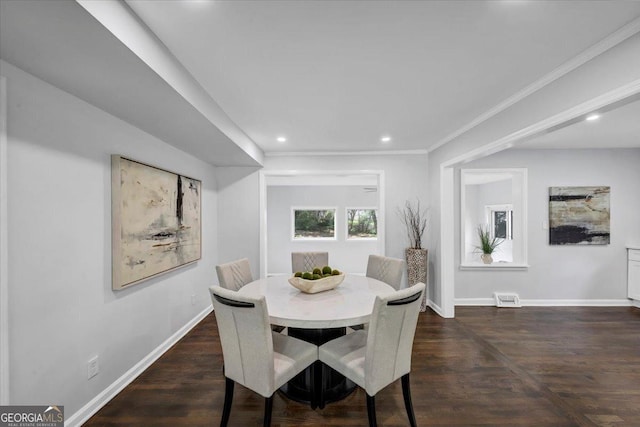 dining room featuring dark wood-style floors, visible vents, recessed lighting, and baseboards