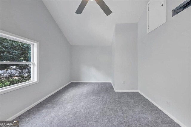 bonus room featuring ceiling fan, baseboards, carpet, and vaulted ceiling