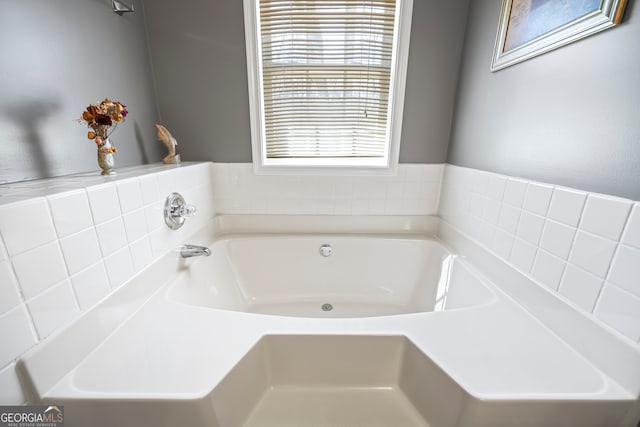 bathroom featuring a bath