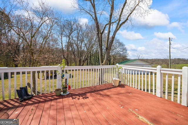 deck featuring a lawn