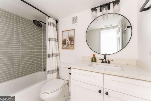 3529 Essex Ave Unit 75, Atlanta, GA 30339 - bathroom featuring vanity, toilet, shower / bath combo, and visible vents