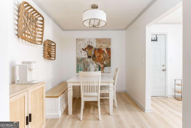 3529 Essex Ave Unit 75, Atlanta, GA 30339 - dining room featuring crown molding, light wood-style flooring, and baseboards