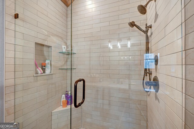 bathroom featuring a stall shower