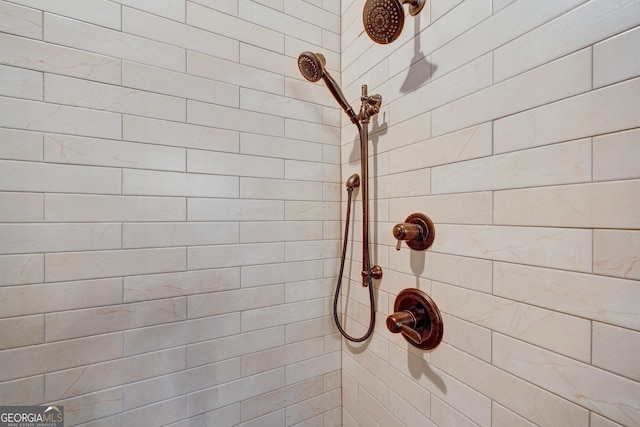 details featuring a tile shower