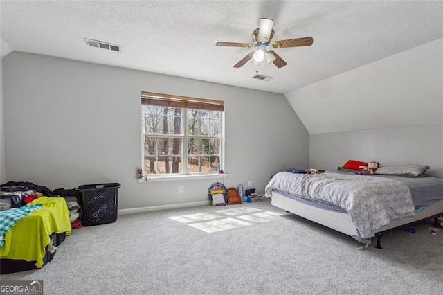 carpeted bedroom with visible vents, baseboards, ceiling fan, lofted ceiling, and a textured ceiling