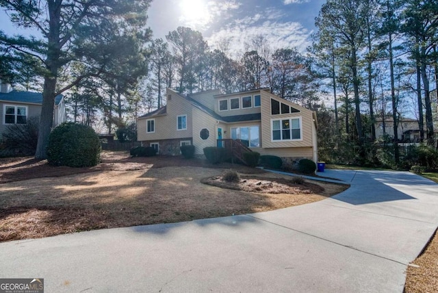 view of front of house featuring concrete driveway