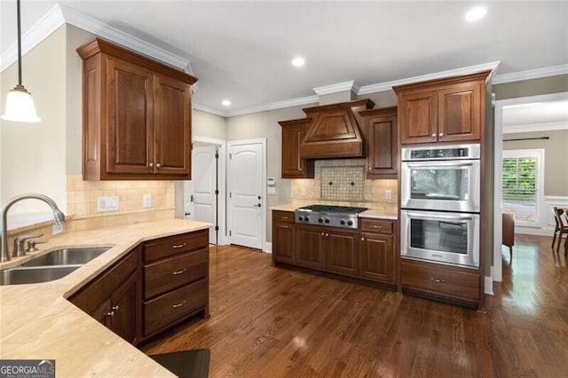 kitchen featuring custom exhaust hood, appliances with stainless steel finishes, dark wood-style flooring, and light countertops