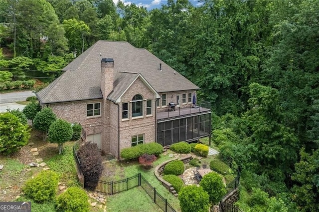 aerial view with a wooded view